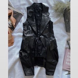 Vintage genuine lamb skin vest. Size S. In excellent condition, no tags.